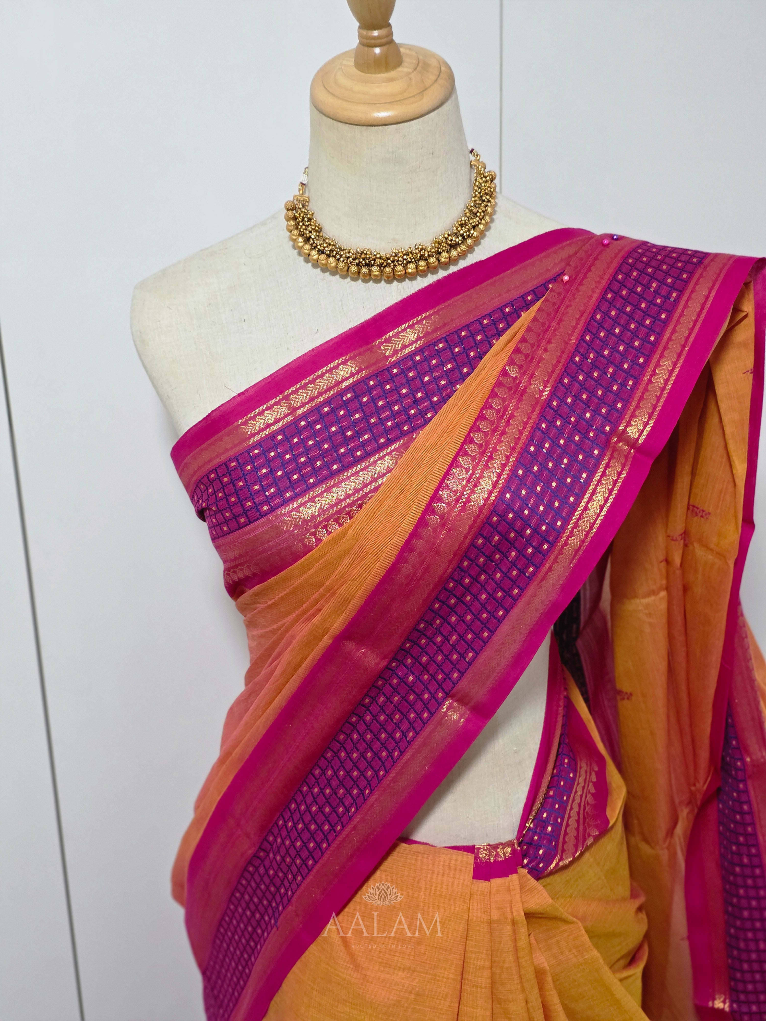 Orange Cotton Saree with Pink and Purple Border