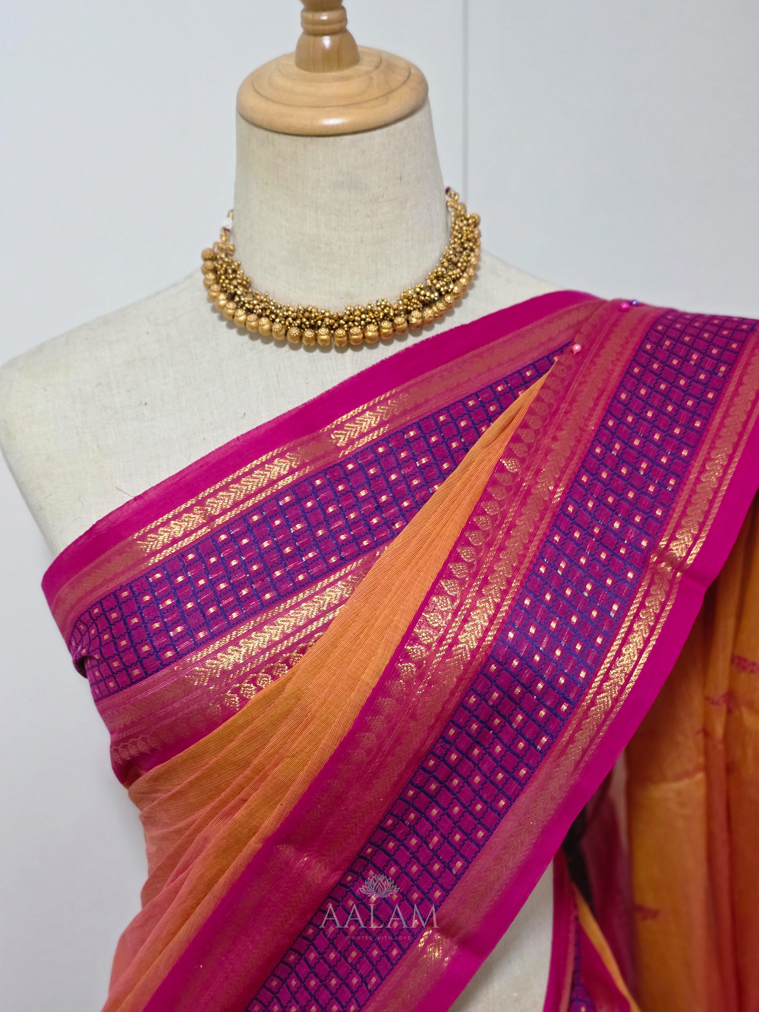 Orange Cotton Saree with Pink and Purple Border