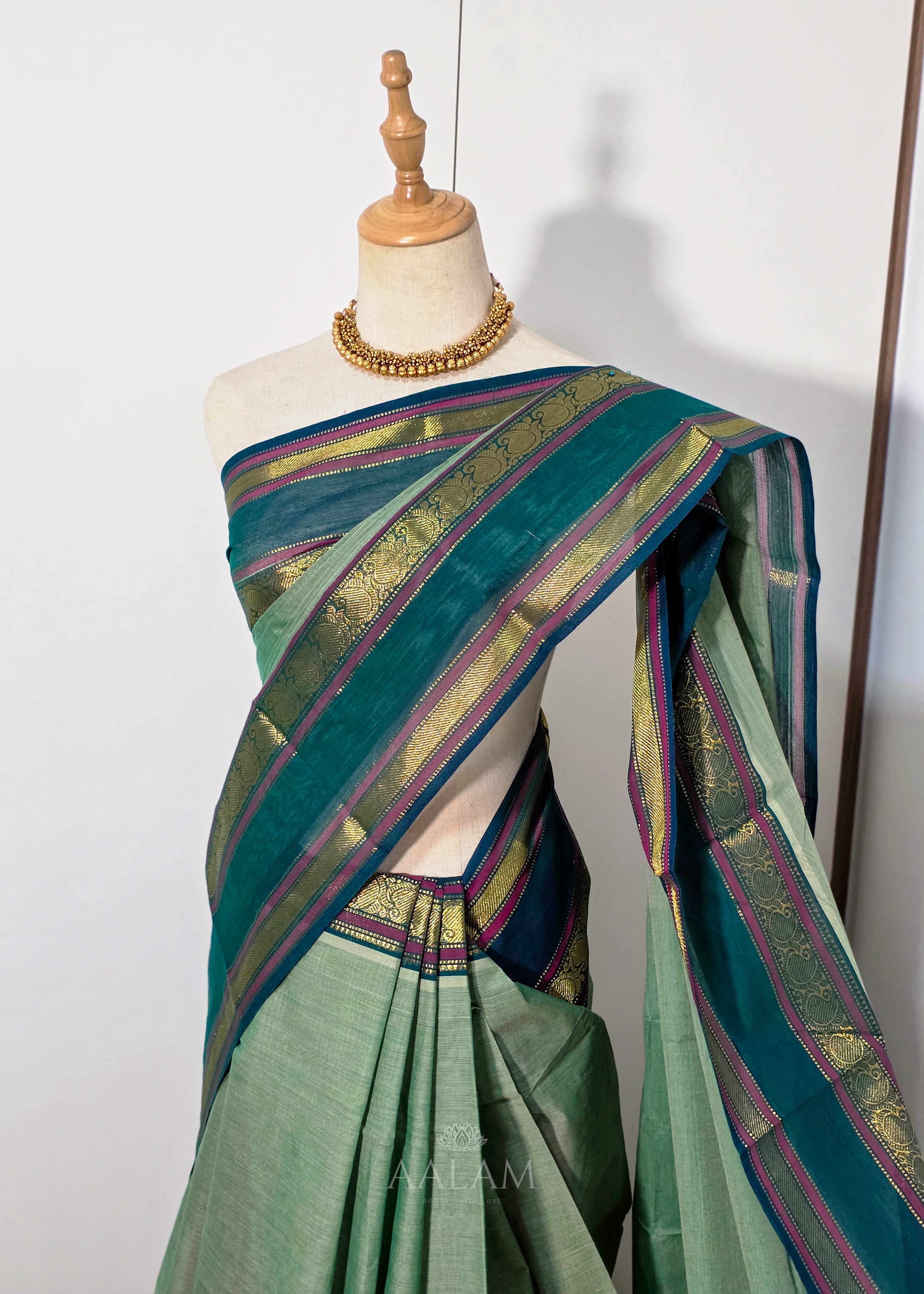 Pistachio Green Cotton Saree with Dark Green Border